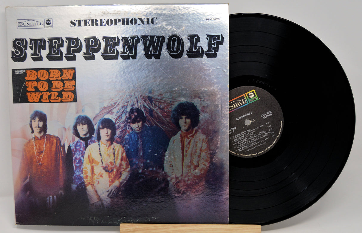 Vinyl record with 'Steppenwolf' album cover featuring band members and text.