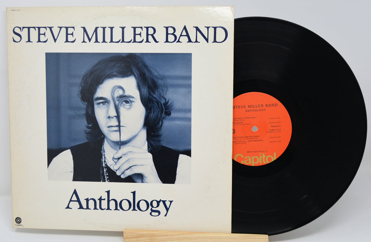 Vinyl record and cover of 'Anthology' by Steve Miller Band on a white background