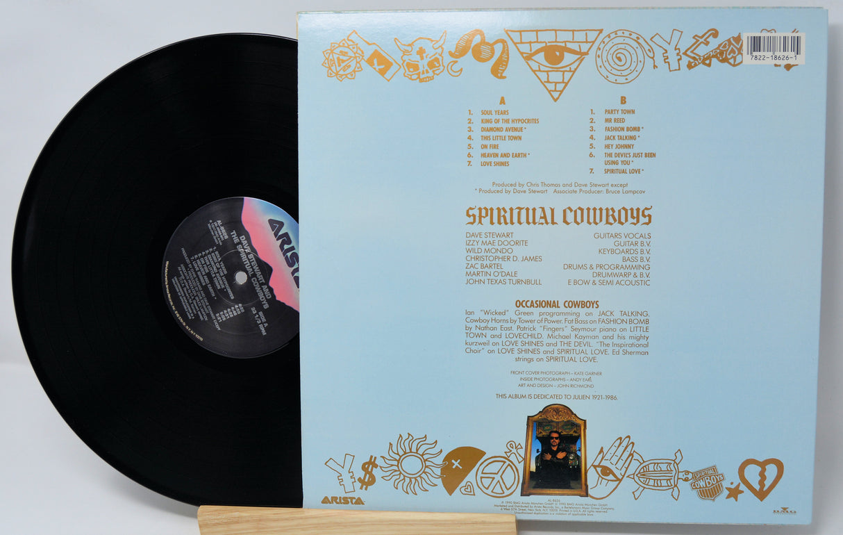 Vinyl record with a blue cover featuring text and decorative elements.