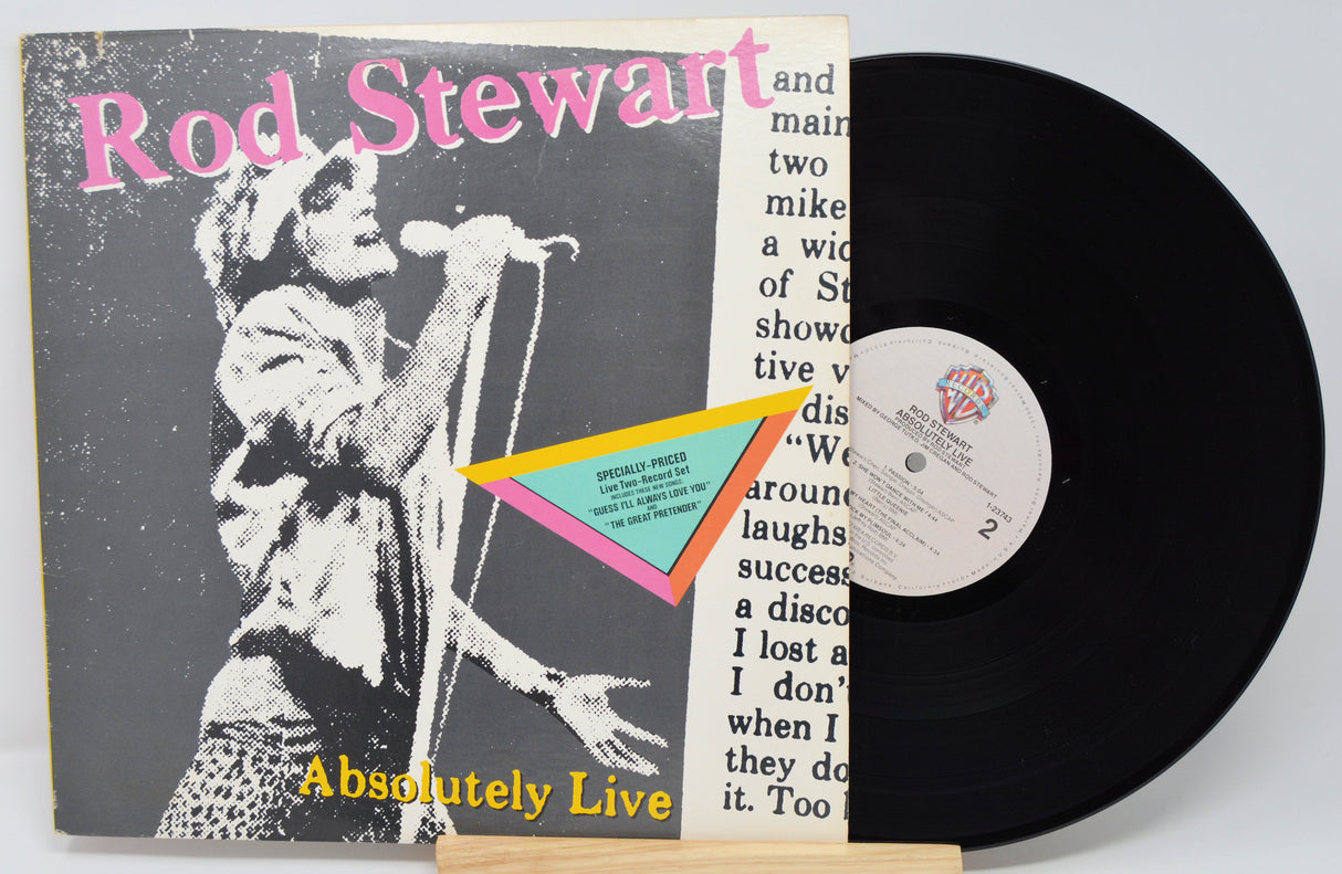 Vinyl record with 'Absolutely Live' by Rod Stewart on a white background