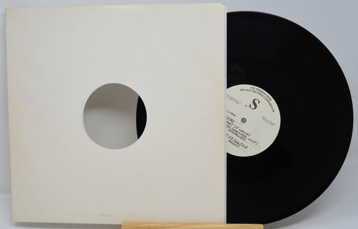 Vinyl record with a white label and beige sleeve on a white background