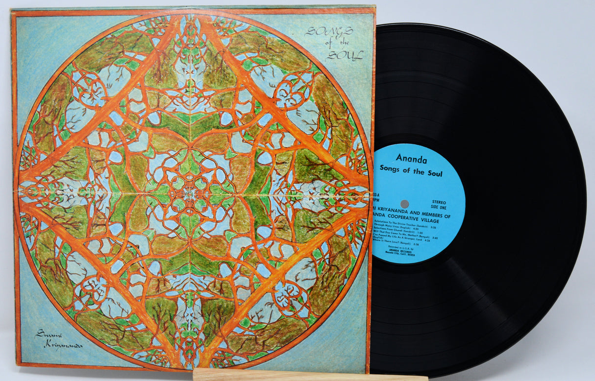 Vinyl record with a colorful geometric cover and visible label.