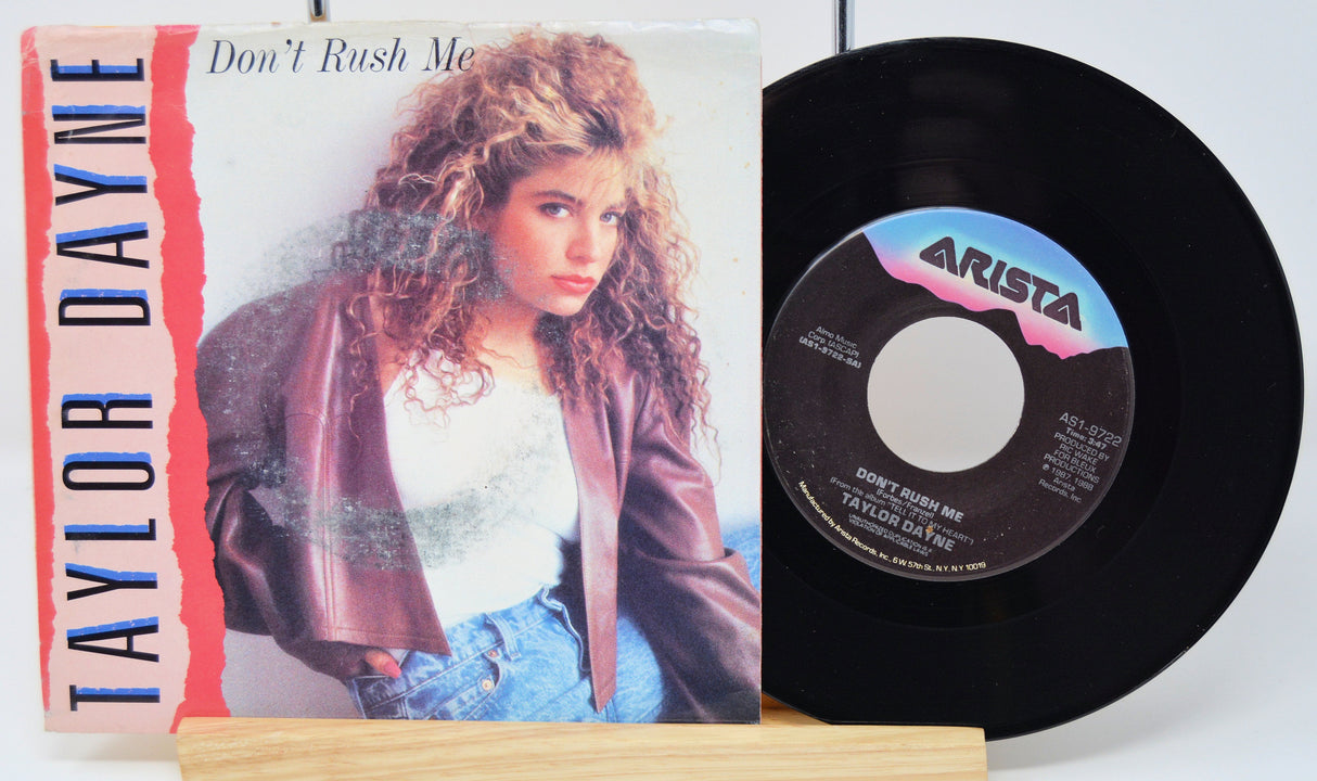 Front cover of Taylor Dayne's Don't Rush Me 7-inch single with vinyl, showing artist photo and title