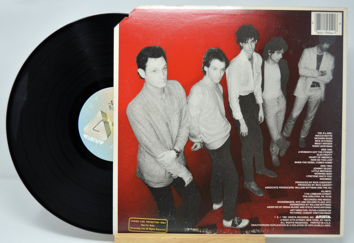 Vinyl record with a red cover featuring a band 'The A's' on a white background