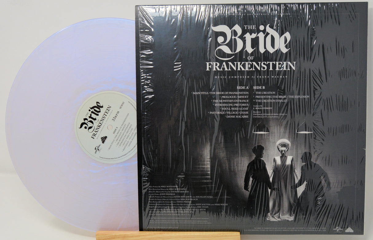 Back cover and iridescent vinyl record of The Bride of Frankenstein soundtrack featuring tracklist and classic imagery
