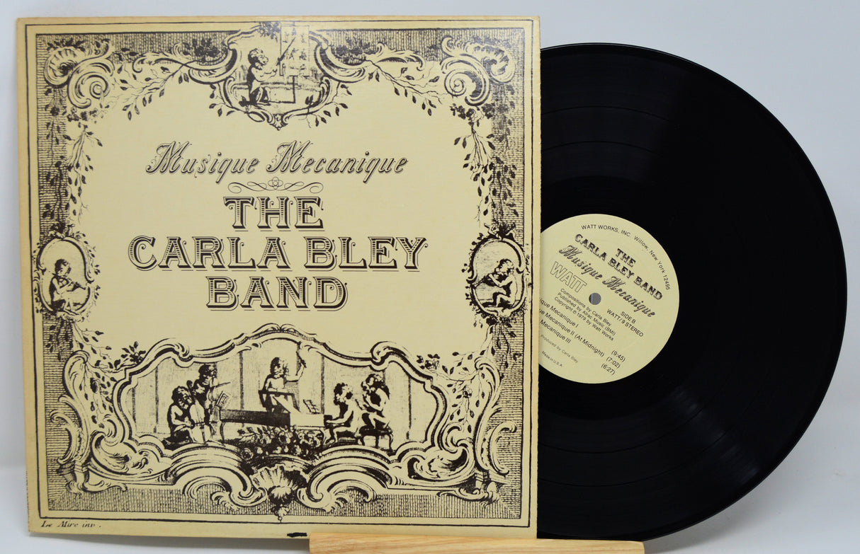 Front cover of The Carla Bley Band - Musique Mecanique vinyl LP with ornate artwork