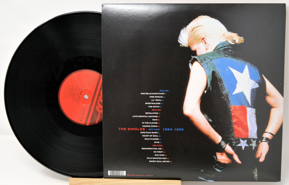 Back cover of The Cult's Pure Cult: The Singles 1984-1995 vinyl, tracklist and band member in star vest