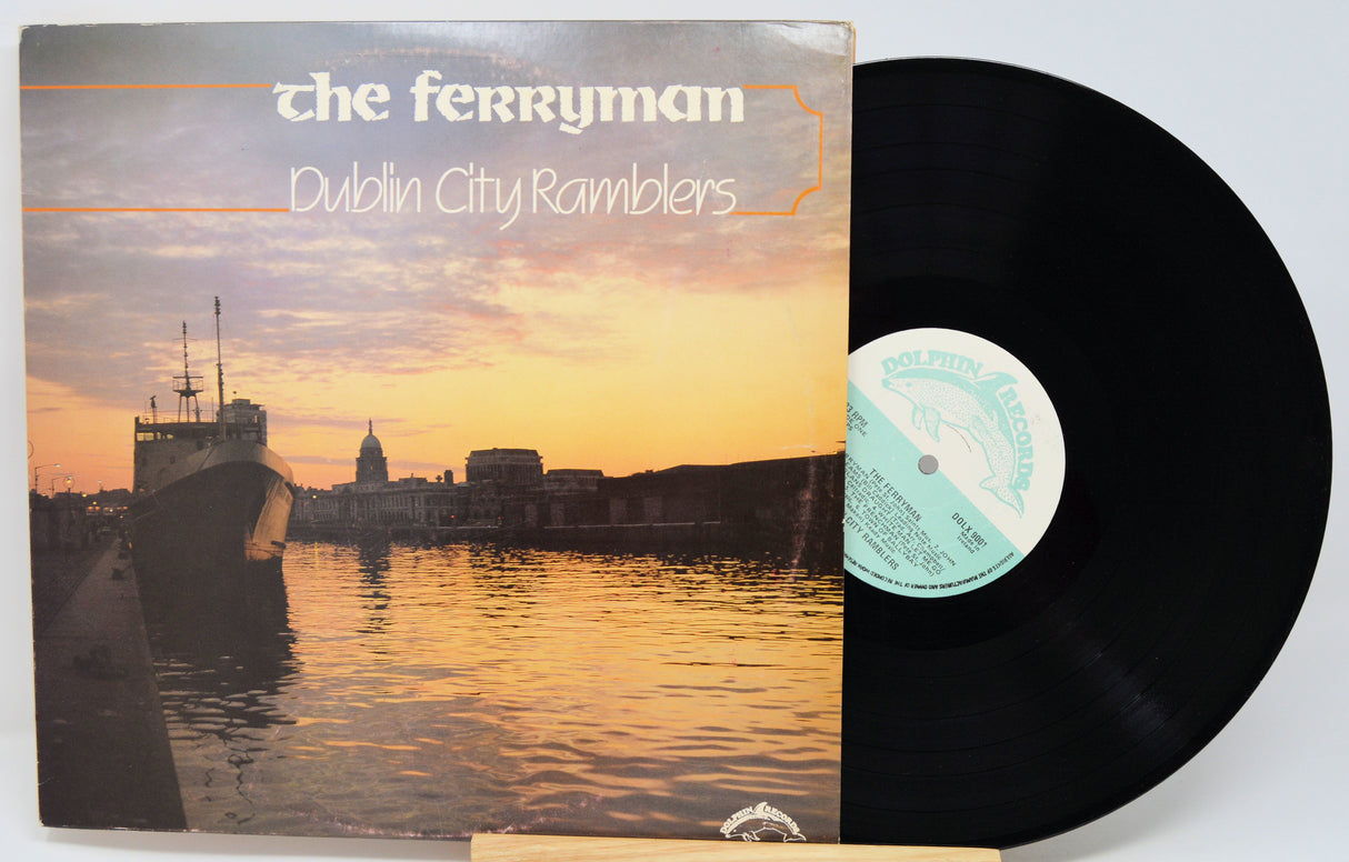 Vinyl record with cover featuring a sunset over water and cityscape, titled 'The Ferryman' by Dublin City Ramblers.