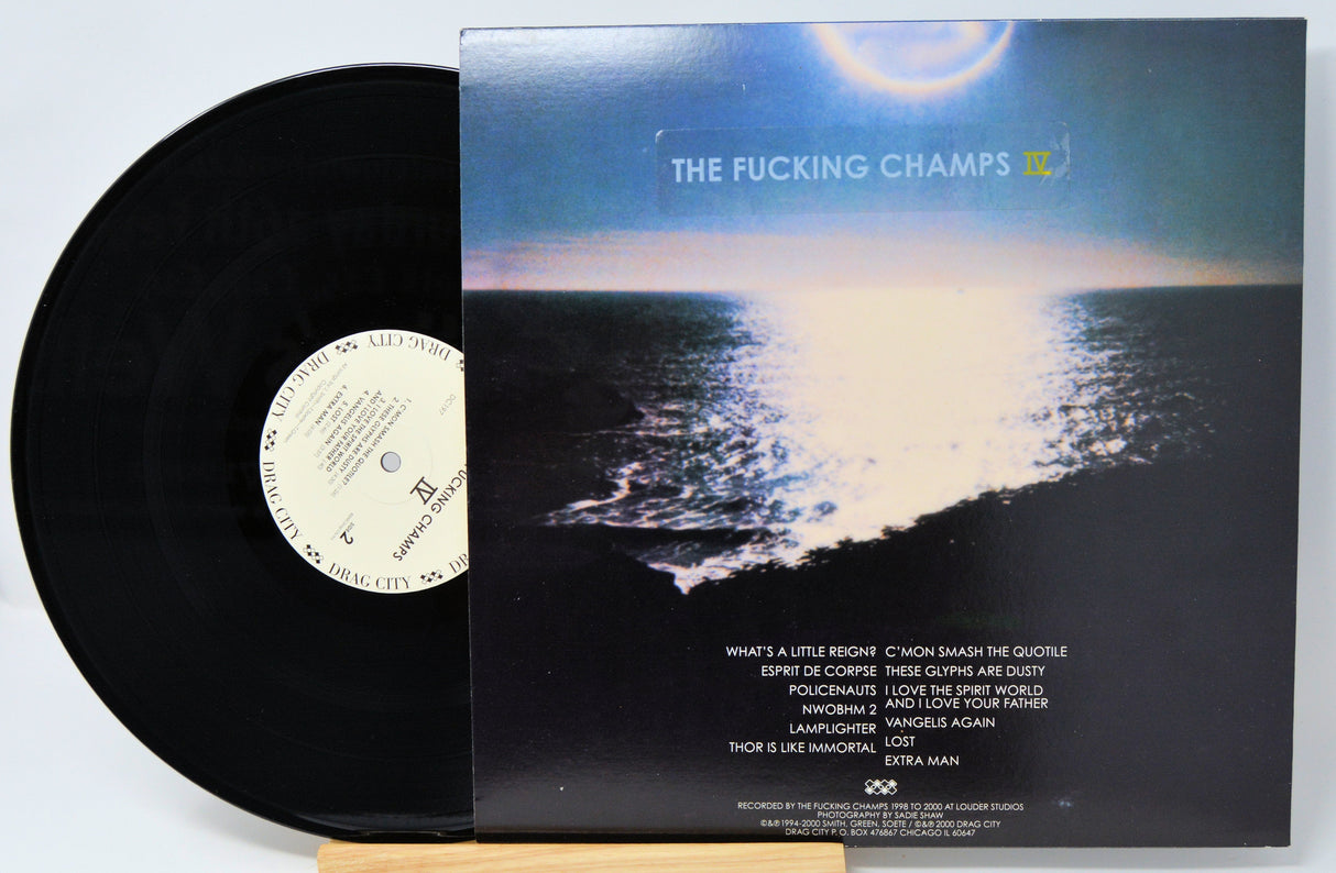 The Fucking Champs IV vinyl record with dramatic ocean sunset album cover