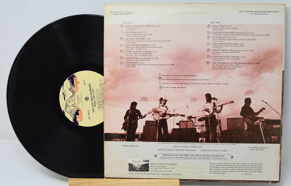 Back cover and vinyl record of The Last Mile Ramblers – While They Last! album, showing tracklist and band photo