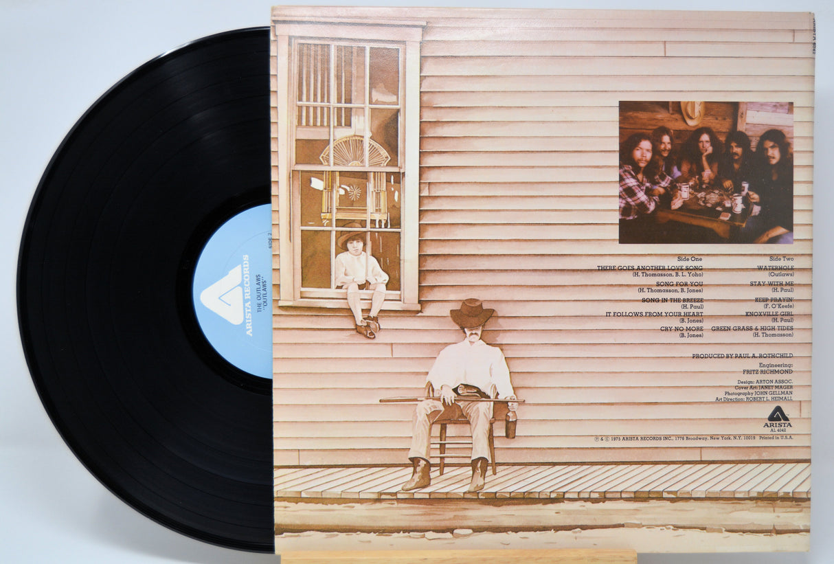 'The Outlaws Self Titled' Vinyl record with a cover featuring a person sitting on a porch.