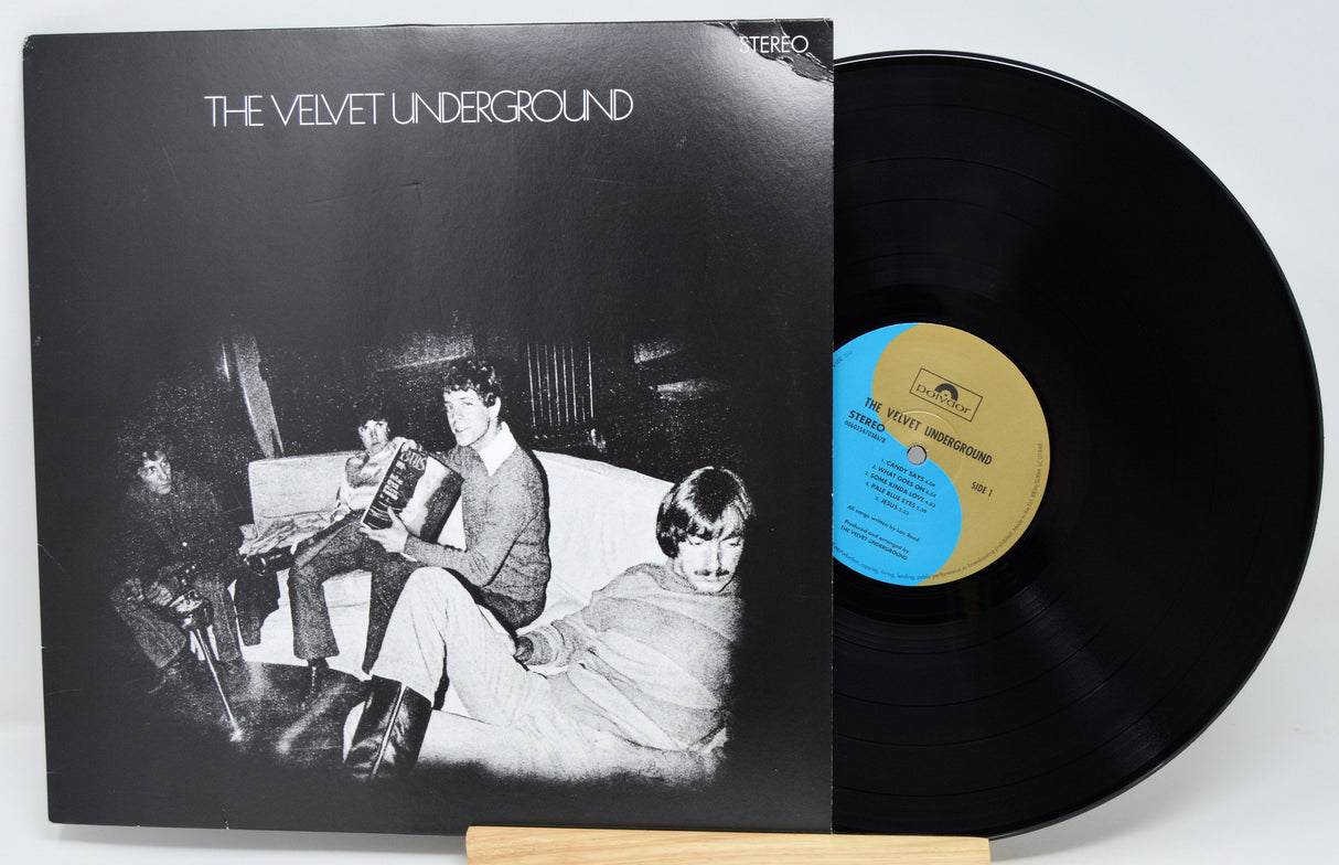 Front cover of The Velvet Underground self-titled vinyl LP with band photo and record partially visible
