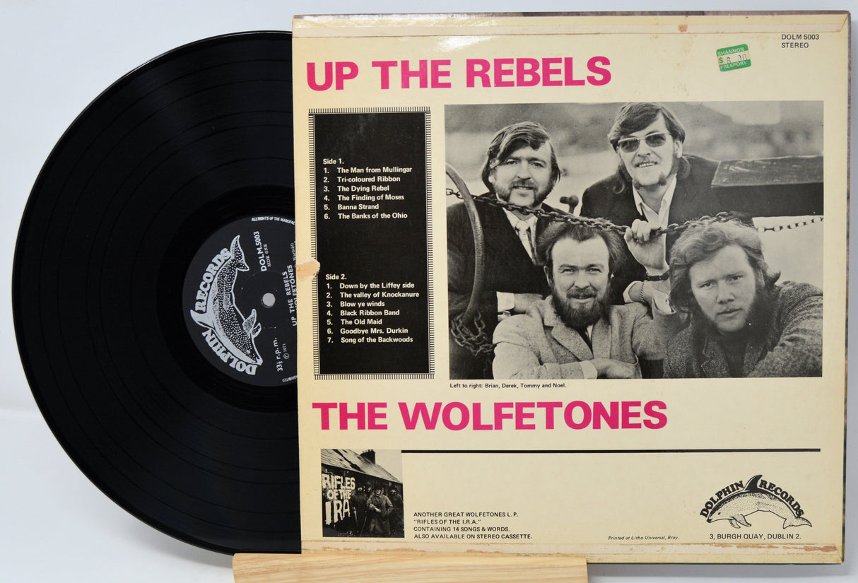Vinyl record with 'Up the Rebels' cover featuring The Wolfetones on a light gray background