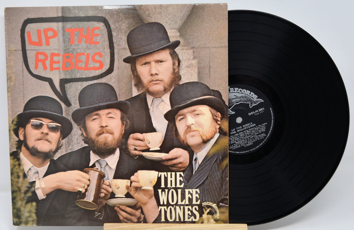 Vinyl record with cover featuring 'The Wolfe Tones' and text 'Up the Rebels'.