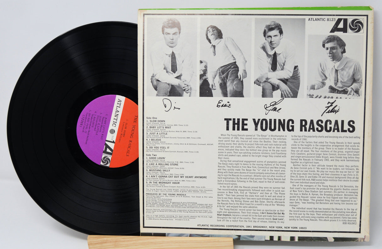 Back cover and vinyl record of The Young Rascals original album featuring tracklist and band photos