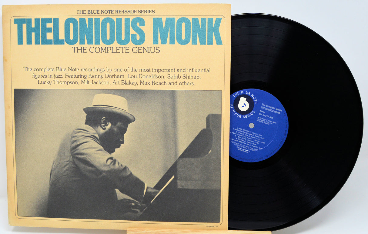Thelonious Monk 'The Complete Genius' vinyl record with its illustrated jacket cover and the black record partially pulled out, showing the blue label.