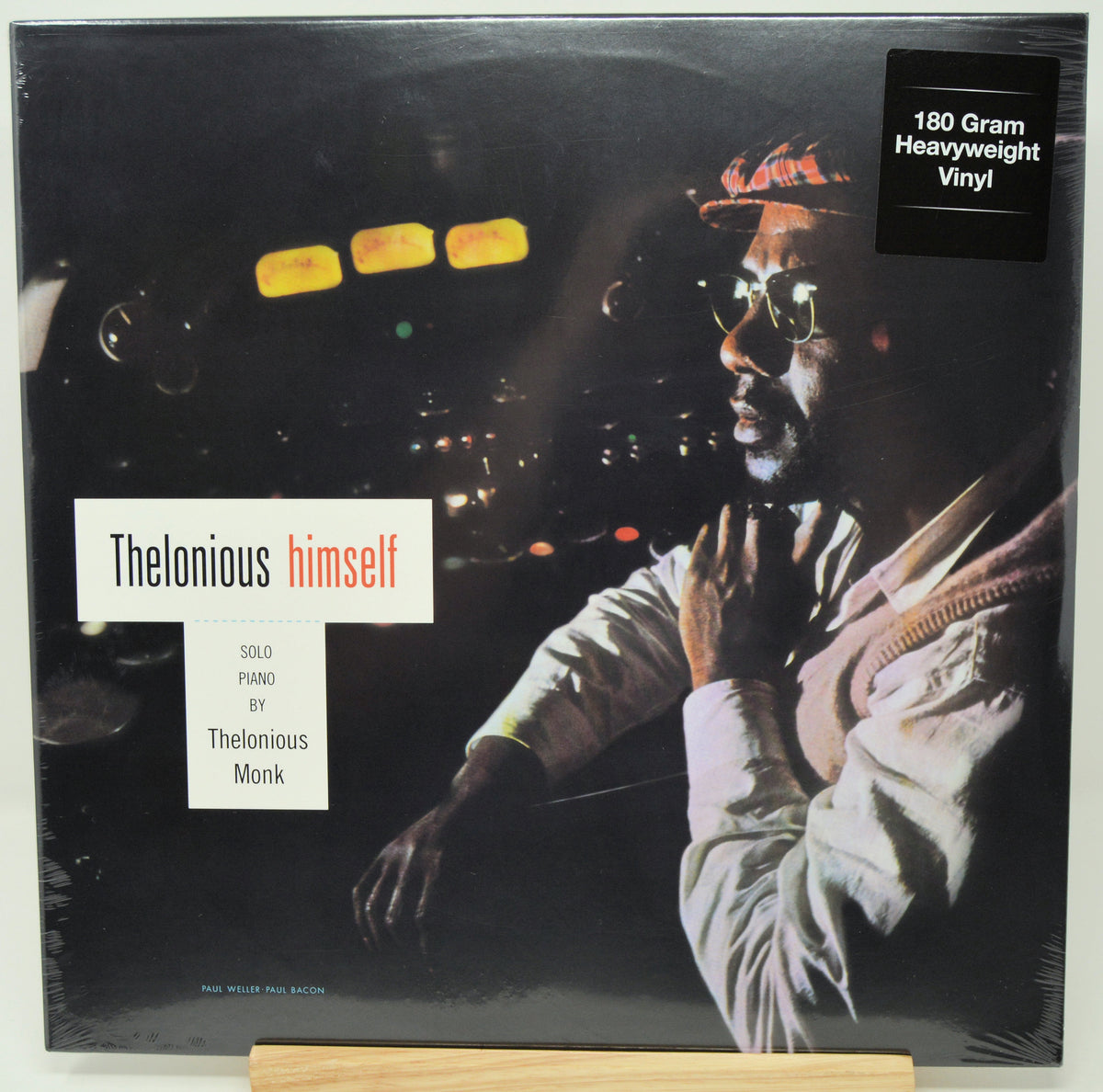 Thelonious Monk 'himself' 180g heavyweight vinyl LP album cover, showing a black-and-white portrait of the musician with a red hat and sunglasses, plus a black '180 Gram Heavyweight Vinyl' sticker in the top right.
