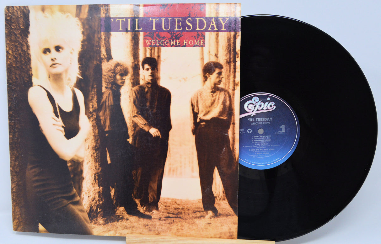 Vinyl record with cover featuring a band and album title 'Til Tuesday Welcome Home'.