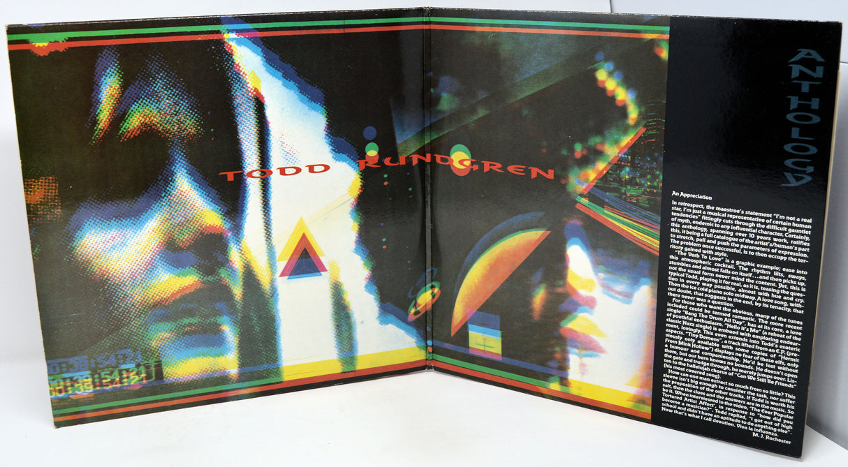 Vinyl record with a cover featuring a scenic landscape and album details.