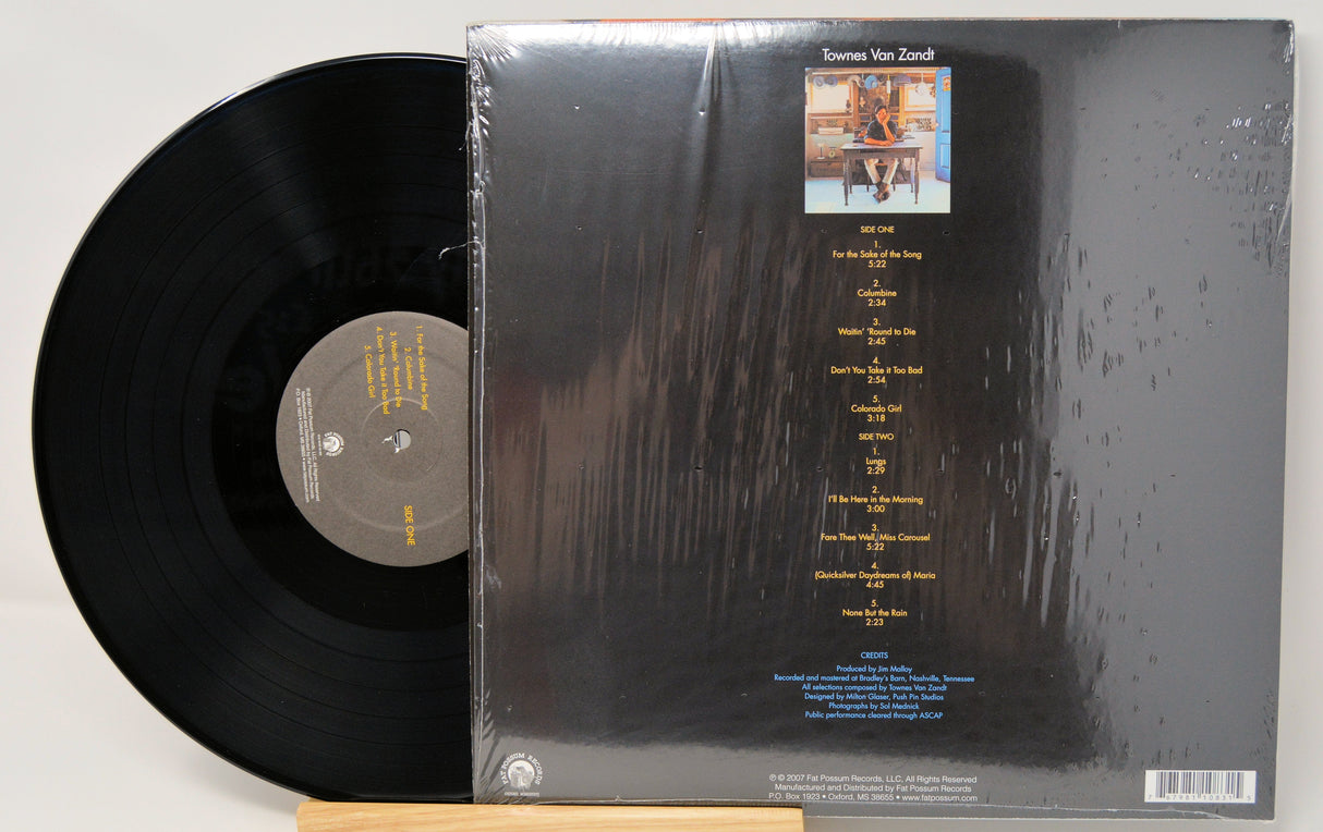 Back cover and vinyl record of Townes Van Zandt LP, showing song list and credits