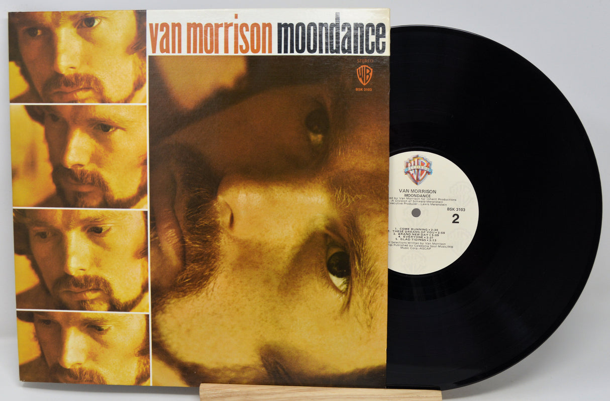 Van Morrison 'Moondance' vinyl record with cover showing multiple faces.