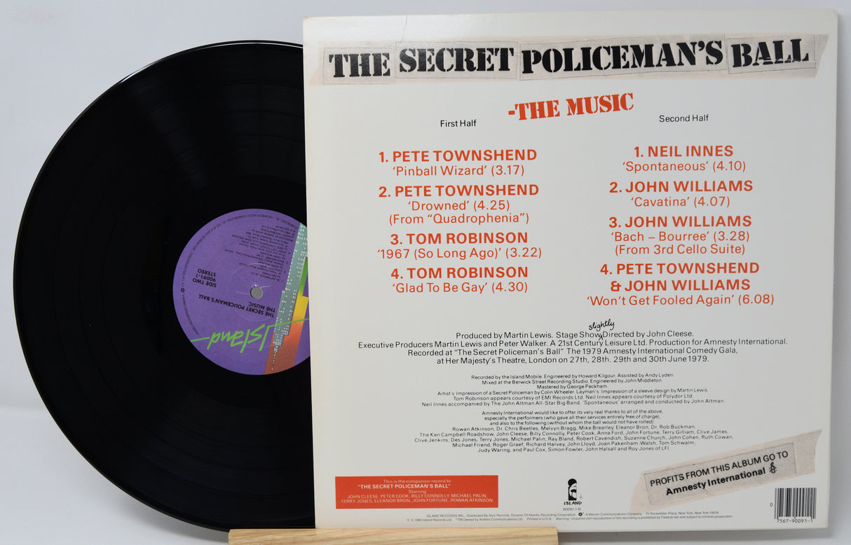 Vinyl record with cover displaying tracklist on a light gray background