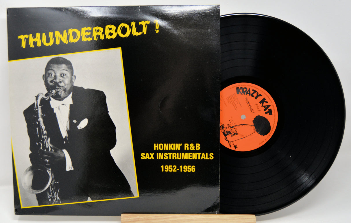 Vinyl record with 'Thunderbolt!' cover featuring a saxophonist and album details.