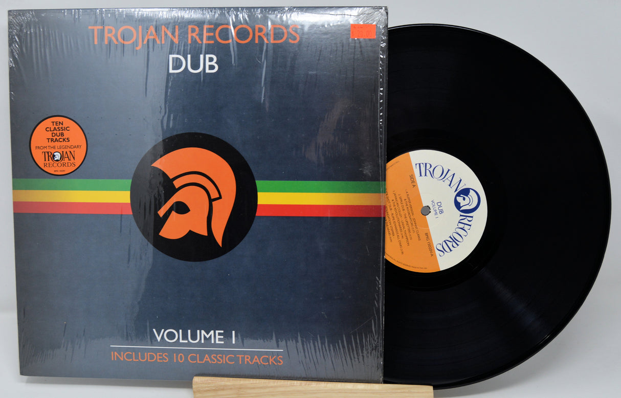 Vinyl record and cover with Trojan Records branding on a gray background