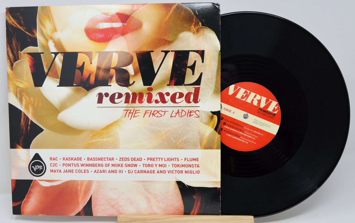 Vinyl record with 'Verve Remixed: The First Ladies' cover featuring a woman's face.