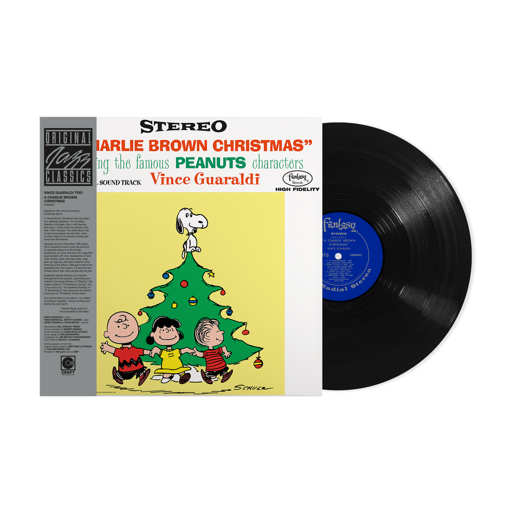 Vinyl record album for 'Jarlie Brown Christmas' sound track by Vince Guaraldi, featuring the illustrated cover with Peanuts characters and a black vinyl record partially pulled out, shown on a white background.