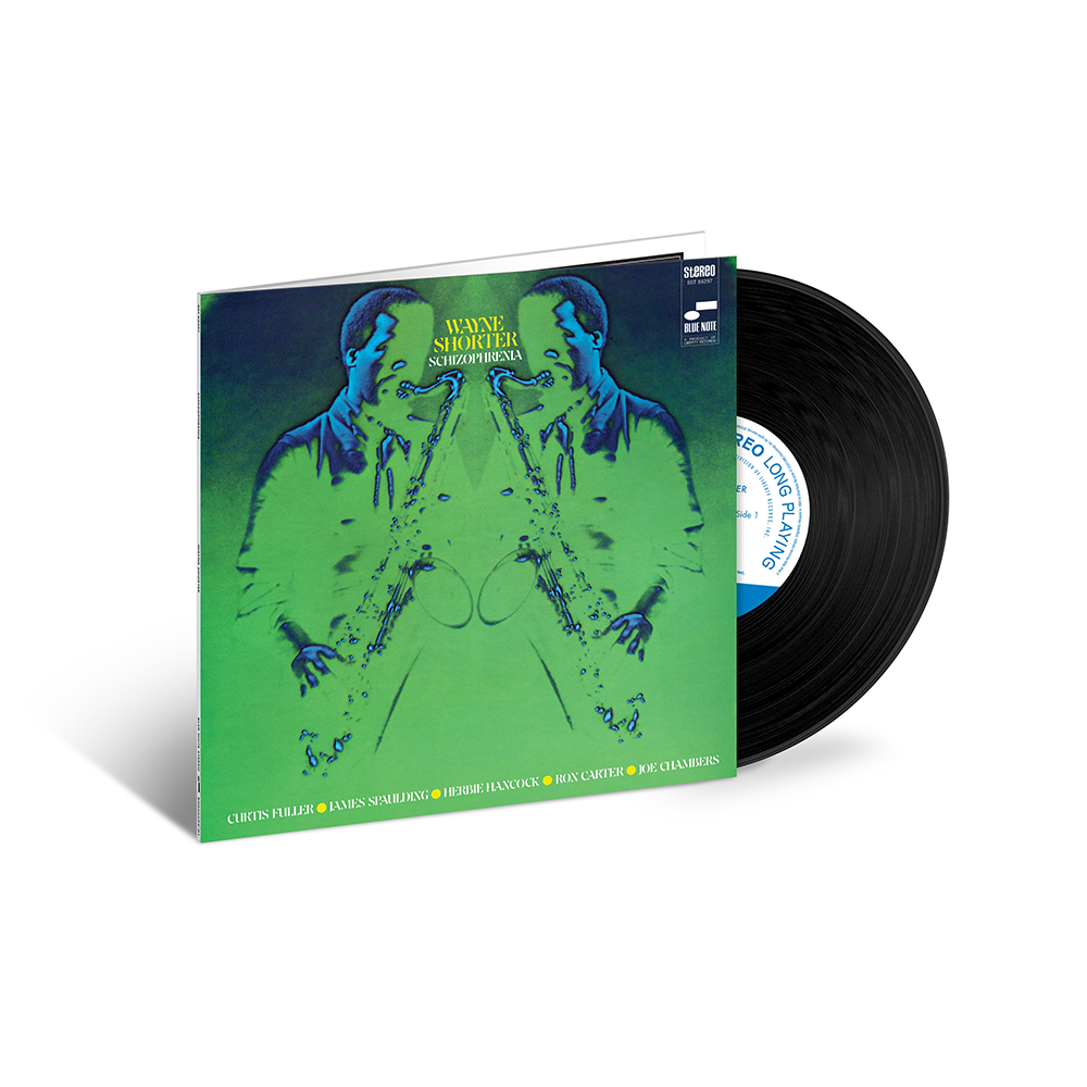 Vinyl record with green and blue cover featuring a saxophonist, on a white background
