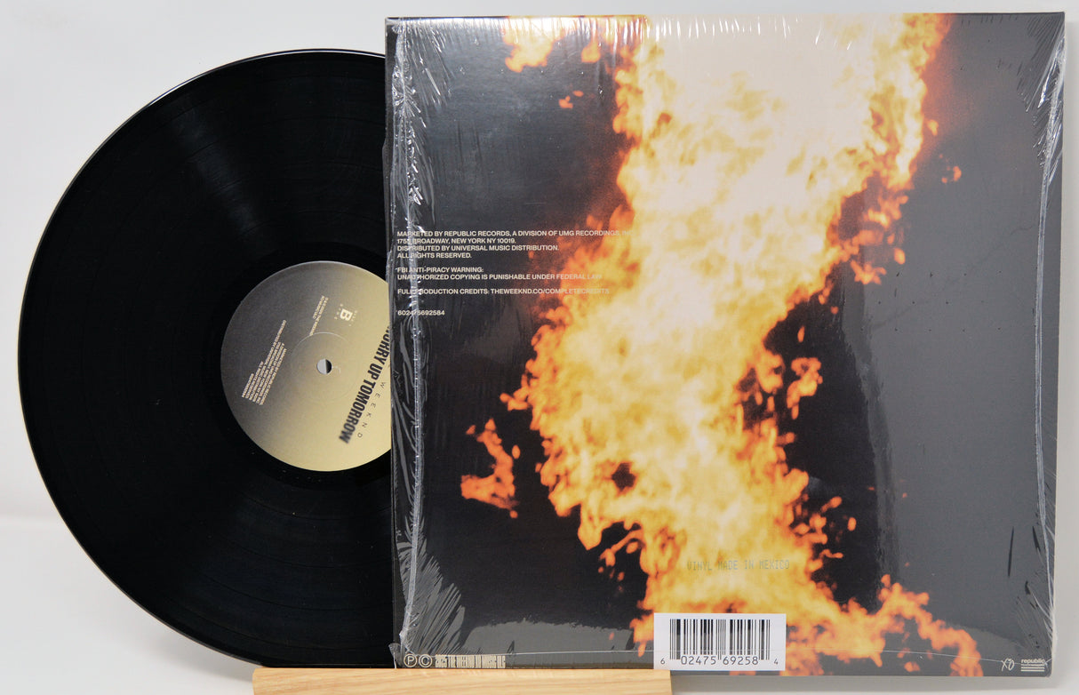 Vinyl record with a fiery design on its cover