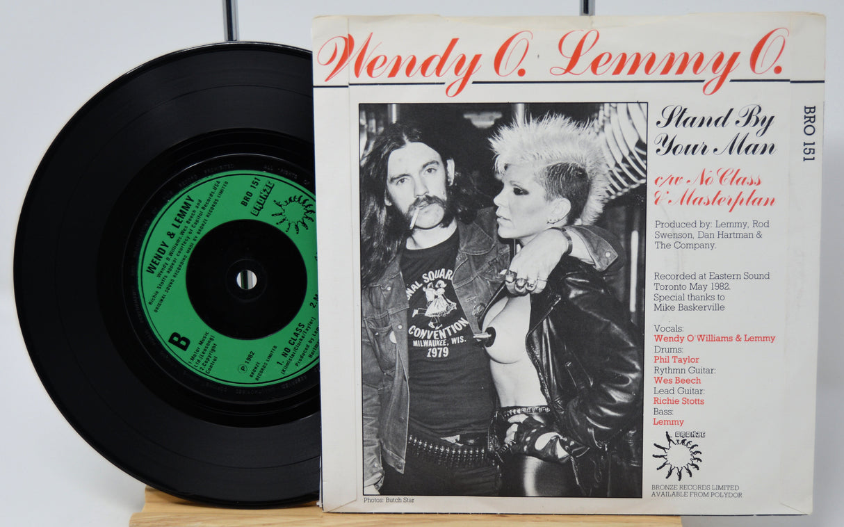 Vinyl record with a black cover featuring a couple and album details.