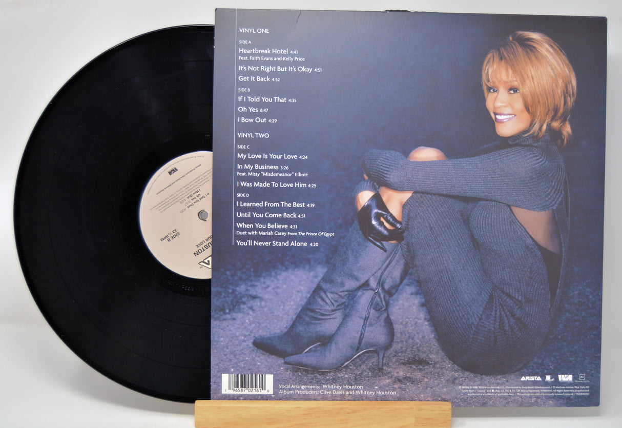 Vinyl record 'Whitney Houston - My Love Is Your Love' with Whitney sitting on the back cover