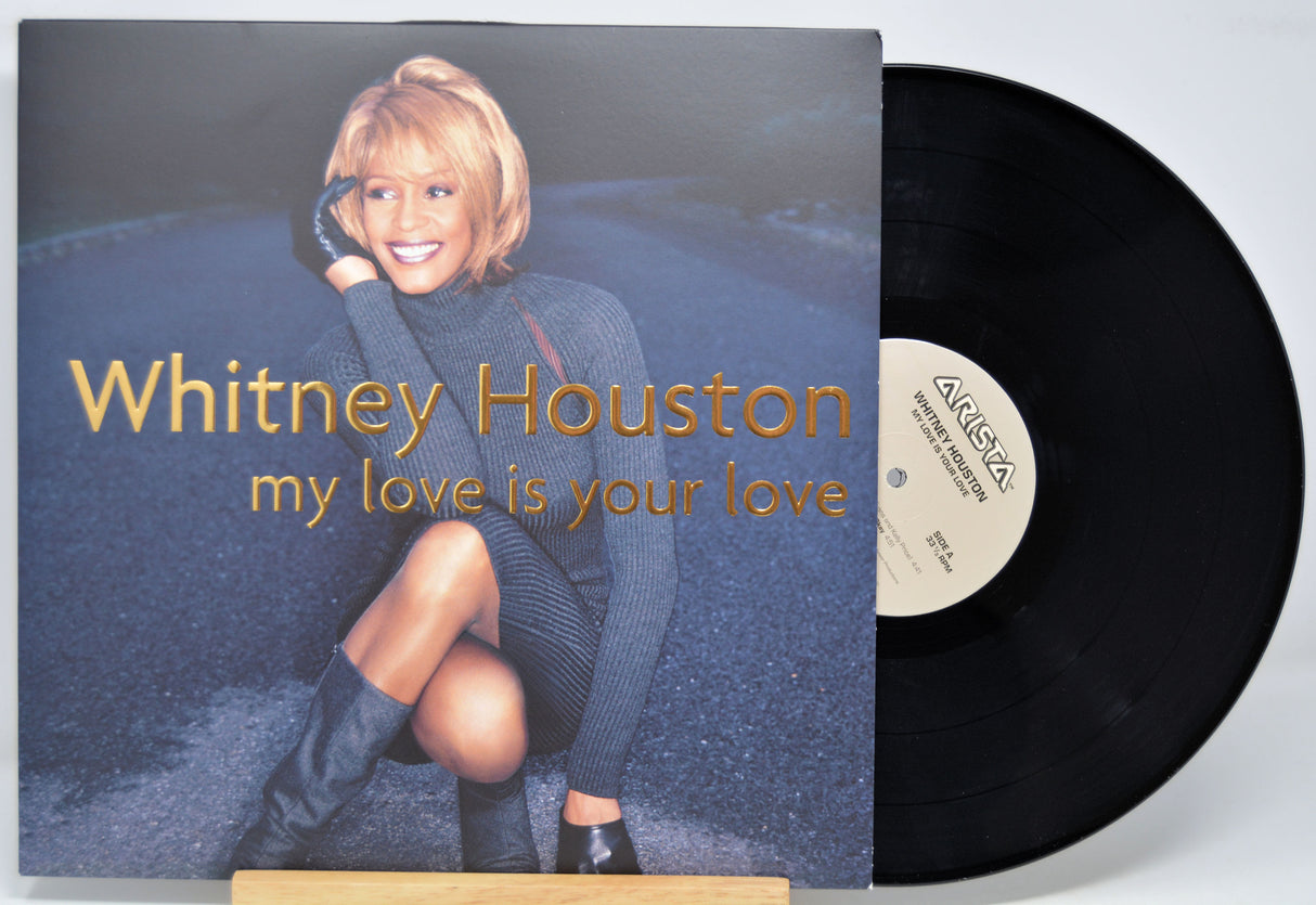 Vinyl record with front cover featuring Whitney Houston and album title 'My Love is Your Love'.