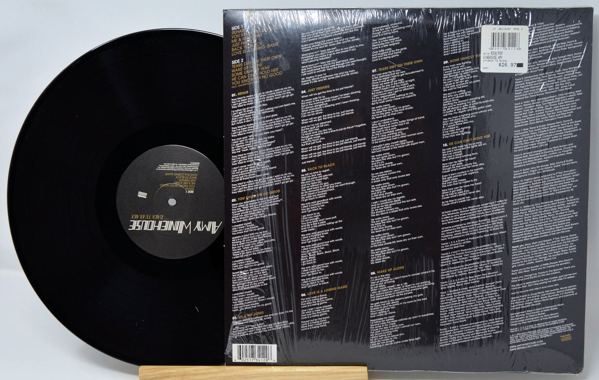 Vinyl record with a detailed back cover listing.