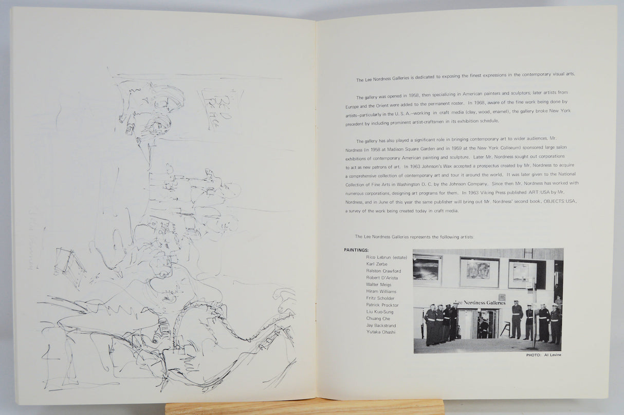 Open book with illustrations and text on a white background