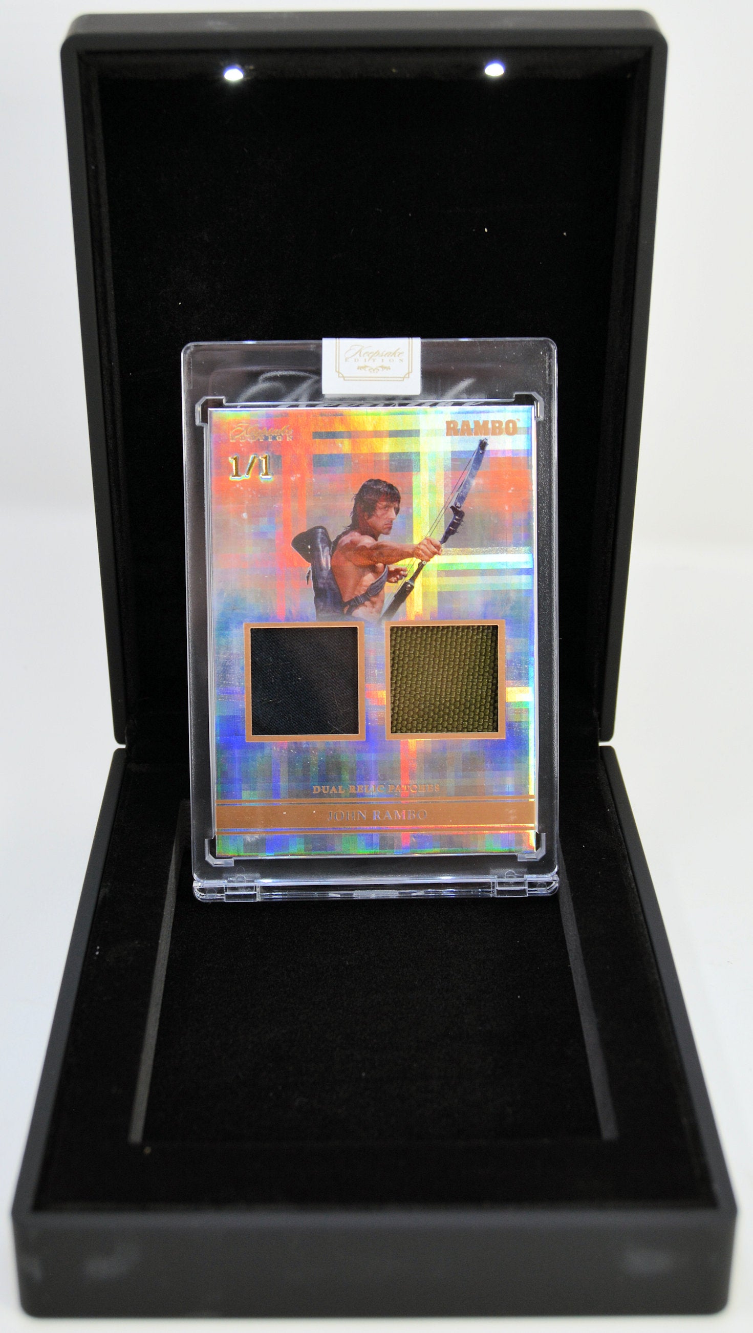 Trading card in a protective case with colorful design and text