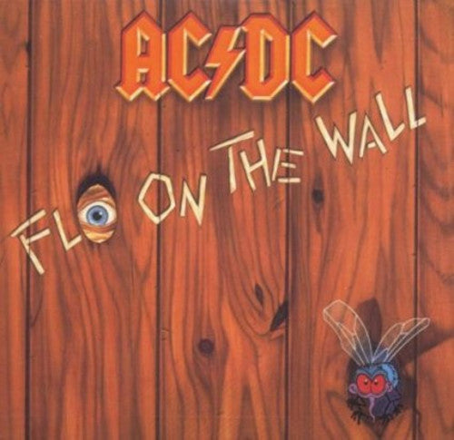 AC/DC - Fly on The Wall vinyl record album cover featuring the band's name against a wood grain background with a fly illustration.
