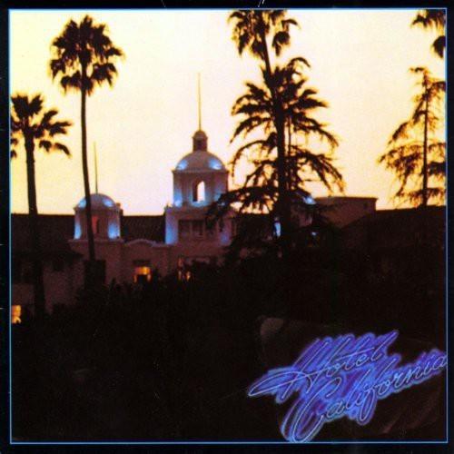 Album cover of Eagles - Hotel California featuring a photograph with palm trees and a building in the background, with the album title in a stylized font at the bottom.