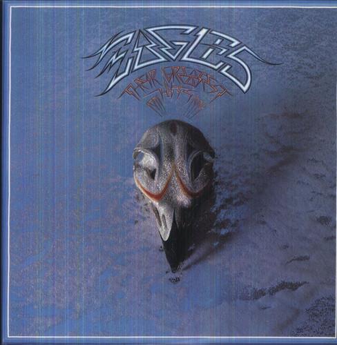 Eagles, The - Greatest Hits The cover art features an image of an eagle with a blurred background, indicating a focus on the eagle and the band name 'Eagles' at the top.
