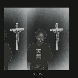This image features the cover art for the vinyl record "Doris" by Earl Sweatshirt. The cover is strikingly dark and moody, displaying a monochrome photograph of a young man standing in front of a large, looming cross.