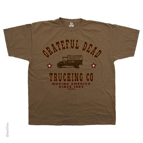 A brown t-shirt featuring the Grateful Dead band with a graphic that includes a truck and the text 'TRUCKING CO Moving America SINCE 1965'.