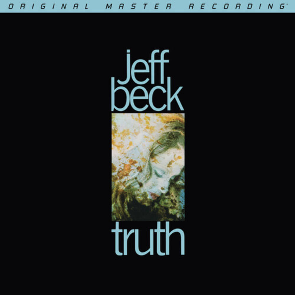 Album cover for 'Truth' by Jeff Beck with a black background and floral design.