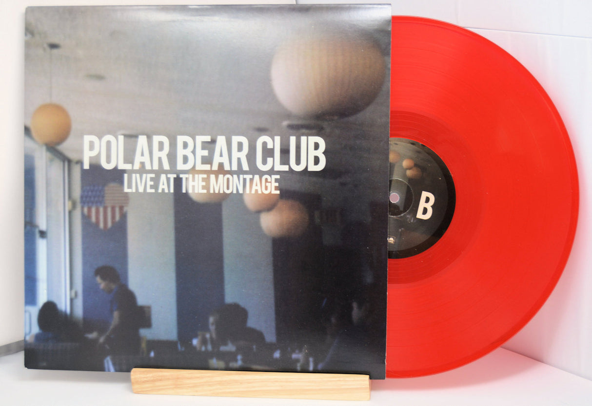A red vinyl record titled 'POLAR BEAR CLUB Live At The Montage' with an image of a band on the cover.