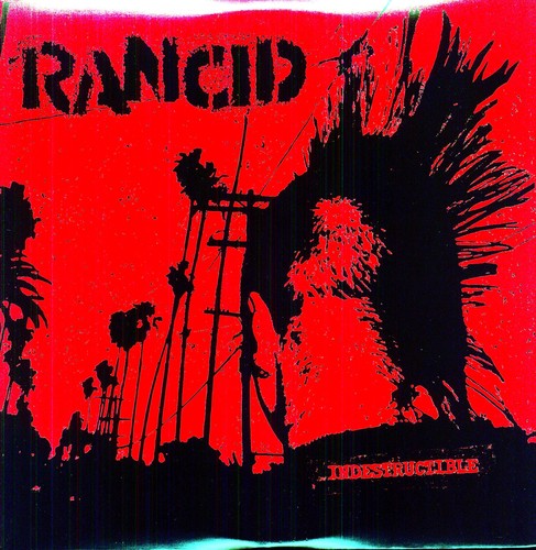 Cover art for Rancid album 'Indestructible' featuring a red and black color scheme with a silhouette of a palm tree and the band's name.