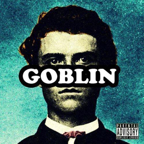 This image features the album cover of "Goblin" by Tyler, The Creator, a prominent album in the hip hop genre. The cover art displays a stylized, grainy portrait of a young man with the album title "GOBLIN" overlayed in bold, white letters across his face.