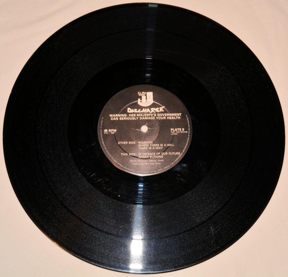 Discharge - Warning: Her Majesty's Government Can Seriously Damage Your Health