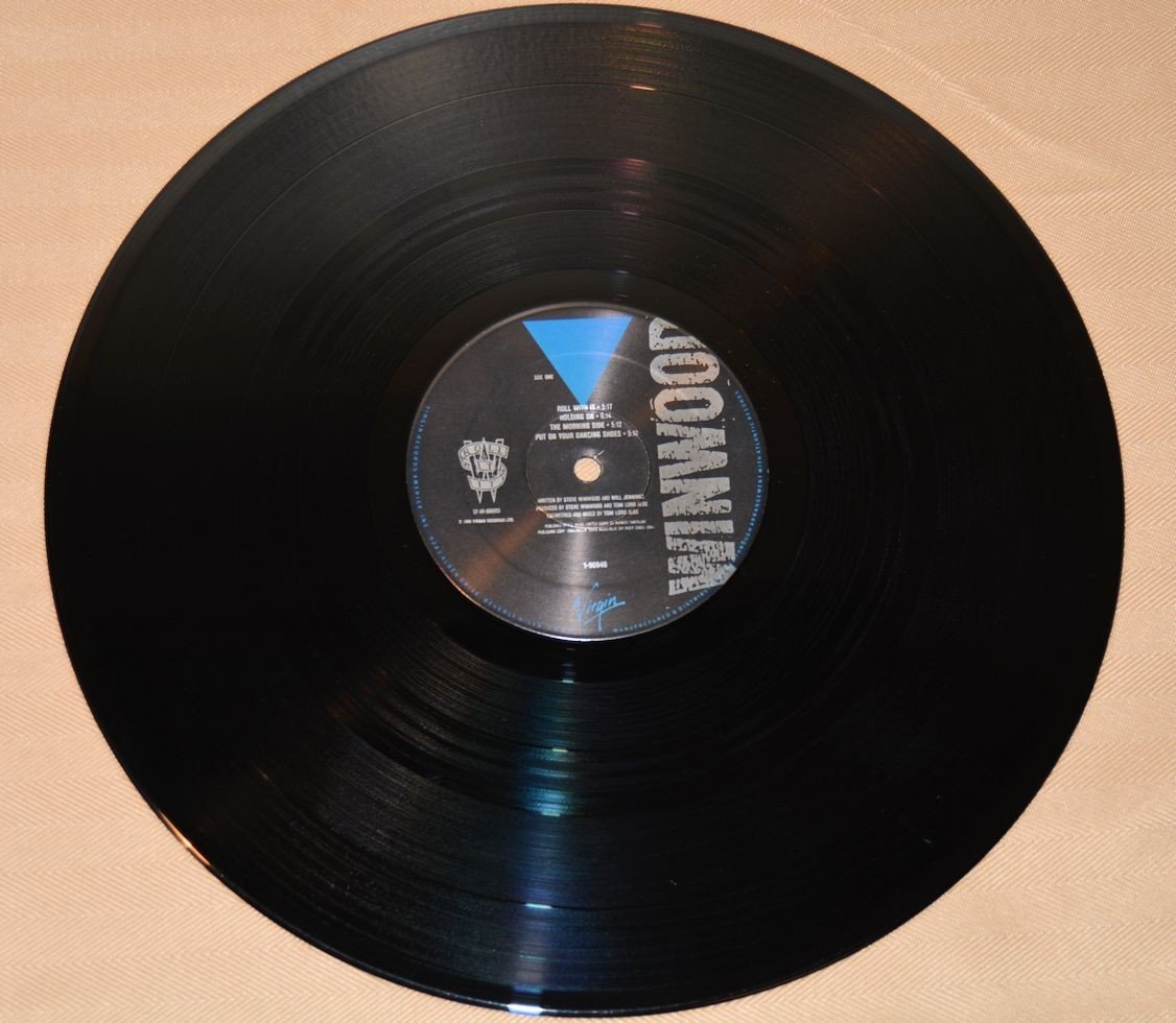 Winwood, Steve - Roll With It