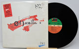 Vinyl record with cover featuring abstract design and text
